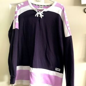 PINK long sleeve lace up T-shirt.